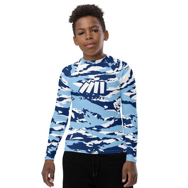 Athletic sports compression shirt for youth football, basketball, baseball, golf, softball etc similar to Nike, Under Armour, Adidas, Sleefs, printed with camouflage baby blue, white, and blue colors.   