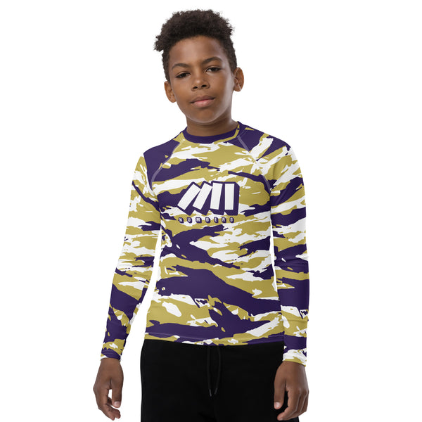 Athletic sports compression shirt for youth football, basketball, baseball, golf, softball etc similar to Nike, Under Armour, Adidas, Sleefs, printed with camouflage purple, gold, and white colors Washington Huskies.    