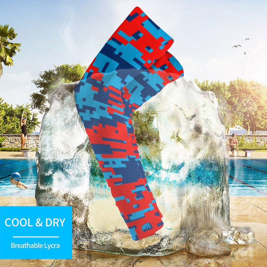 Athletic sports compression arm sleeve for youth and adult football, basketball, baseball, and softball printed with digicamo blue, light blue, and red colors. 