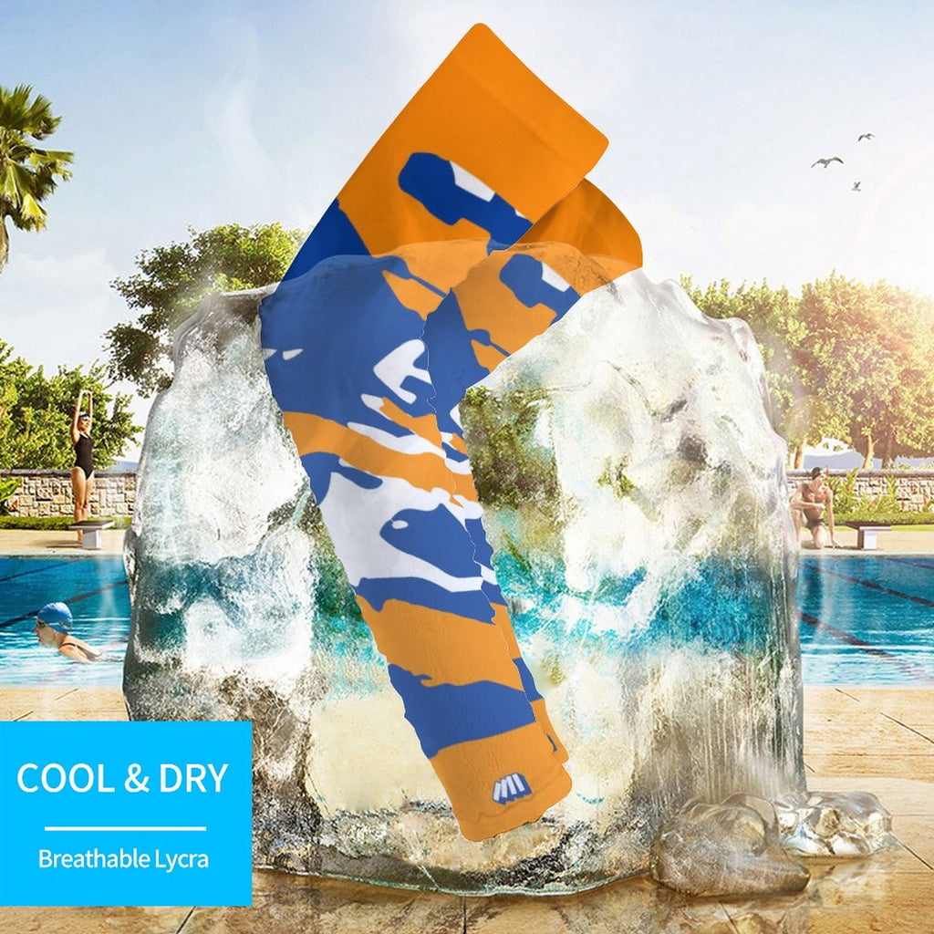 Athletic sports compression arm sleeve for youth and adult football, basketball, baseball, and softball printed with predator blue, orange, and white colors. 