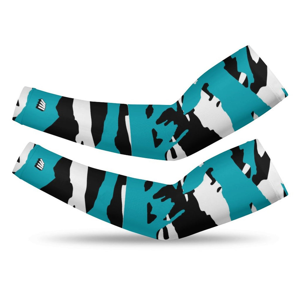 Athletic sports compression arm sleeve for youth and adult football, basketball, baseball, and softball printed with predator turquoise, black, and white colors.  