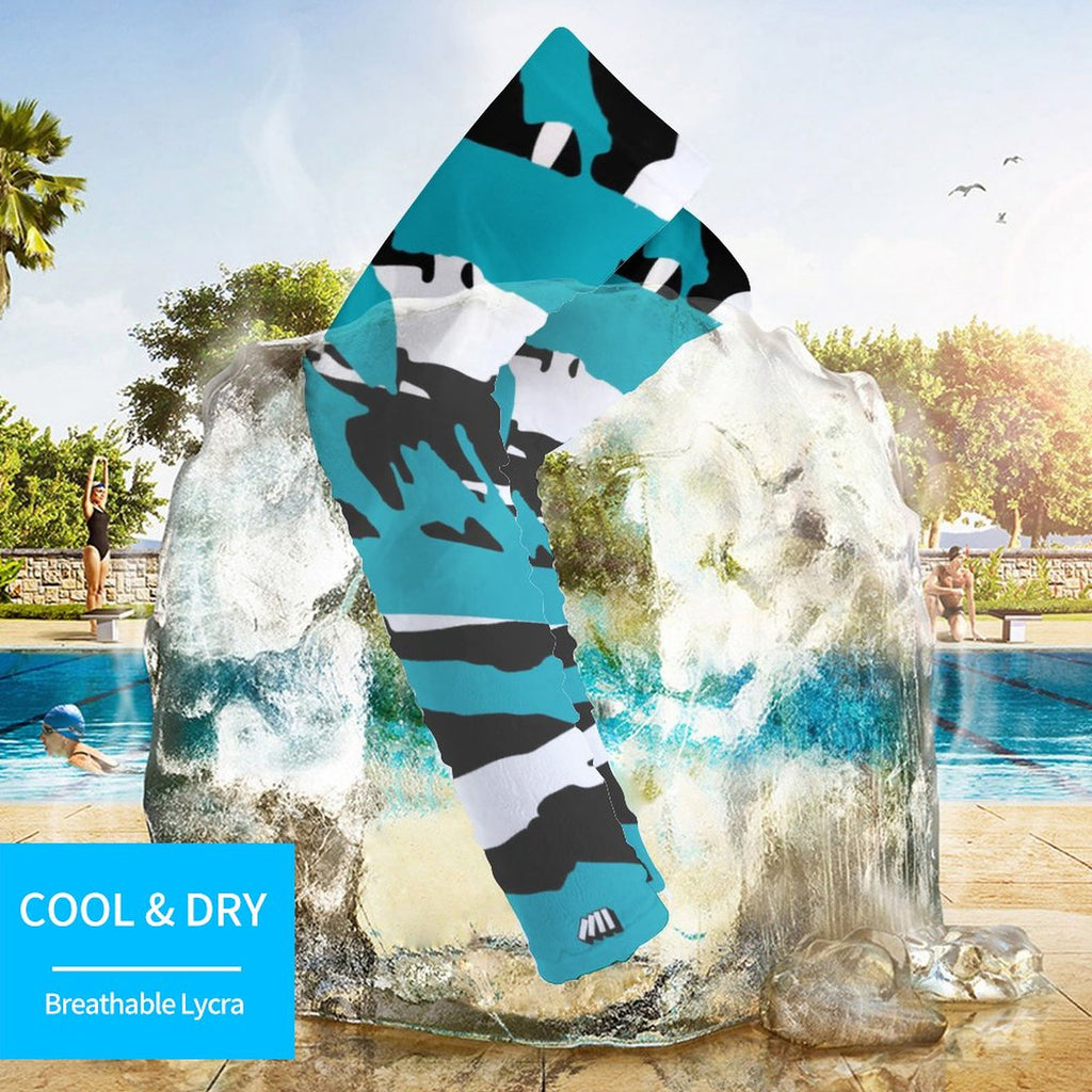 Athletic sports compression arm sleeve for youth and adult football, basketball, baseball, and softball printed with predator turquoise, black, and white colors.  