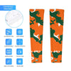 Athletic sports compression arm sleeve for youth and adult football, basketball, baseball, and softball printed with camo orange, green, and white colors. 
