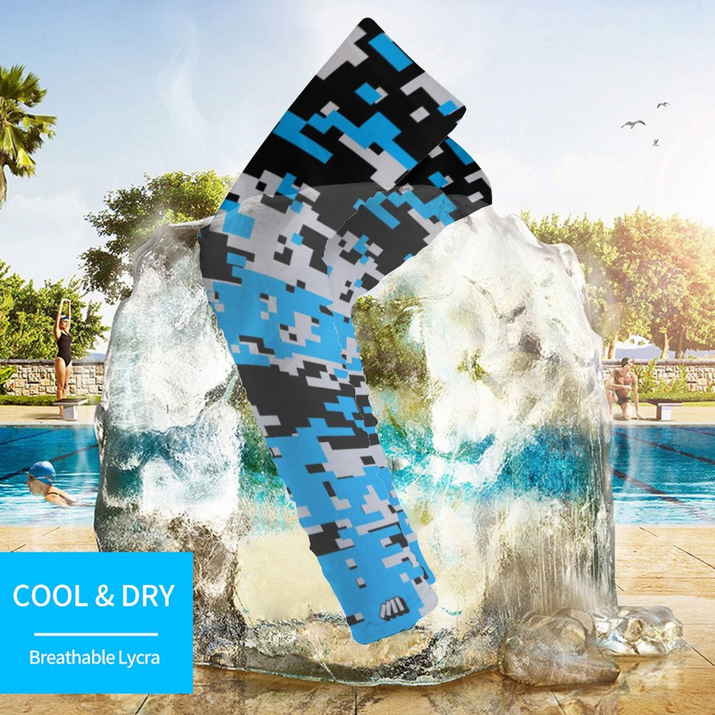 Athletic sports compression arm sleeve for youth and adult football, basketball, baseball, and softball printed with digicamo black, light blue, and gray colors. 