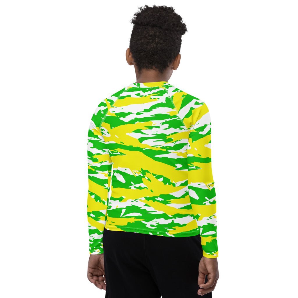 Athletic sports compression shirt for youth football, basketball, baseball, golf, softball etc similar to Nike, Under Armour, Adidas, Sleefs, printed with camouflage neon, yellow, white, and green colors.    