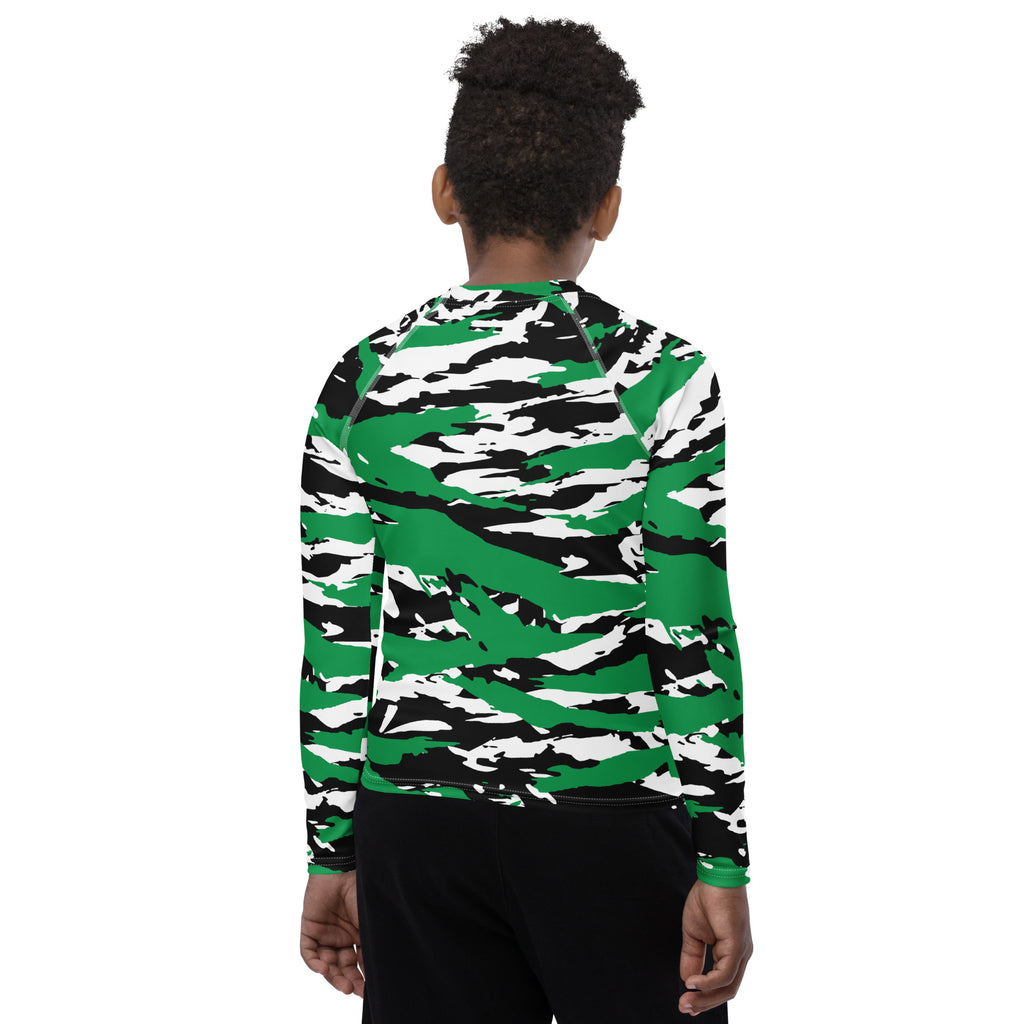 Athletic sports compression shirt for youth football, basketball, baseball, golf, softball etc similar to Nike, Under Armour, Adidas, Sleefs, printed with camouflage green, white, and black colors Boston Celtics.  