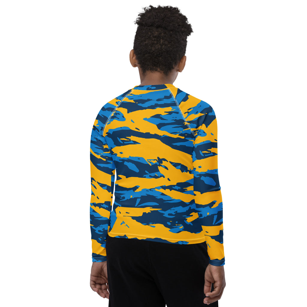 Athletic sports compression shirt for youth football, basketball, baseball, golf, softball etc similar to Nike, Under Armour, Adidas, Sleefs, printed with camouflage colors Los Angeles Chargers. 