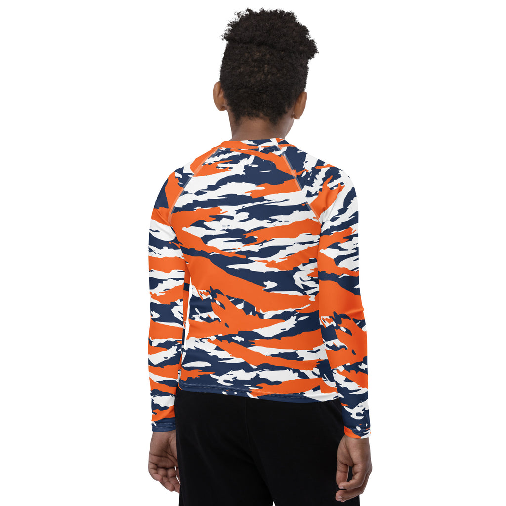 Athletic sports compression shirt for youth football, basketball, baseball, golf, softball etc similar to Nike, Under Armour, Adidas, Sleefs, printed with camouflage navy blue, orange, and white colors Denver Broncos. .   