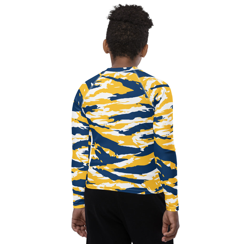 Athletic sports compression shirt for youth football, basketball, baseball, golf, softball etc similar to Nike, Under Armour, Adidas, Sleefs, printed with camouflage navy blue, yellow, and white colors.    