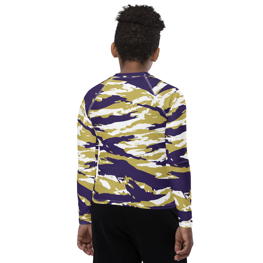 Athletic sports compression shirt for youth football, basketball, baseball, golf, softball etc similar to Nike, Under Armour, Adidas, Sleefs, printed with camouflage purple, gold, and white colors Washington Huskies.    