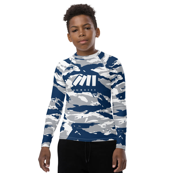 Athletic sports compression shirt for youth football, basketball, baseball, golf, softball etc similar to Nike, Under Armour, Adidas, Sleefs, printed with camouflage navy blue, white, and gray colors.      