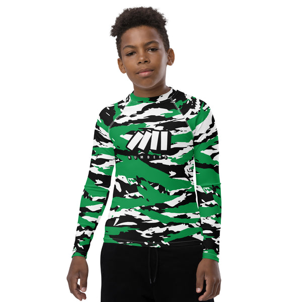 Athletic sports compression shirt for youth football, basketball, baseball, golf, softball etc similar to Nike, Under Armour, Adidas, Sleefs, printed with camouflage green, white, and black colors Boston Celtics.  