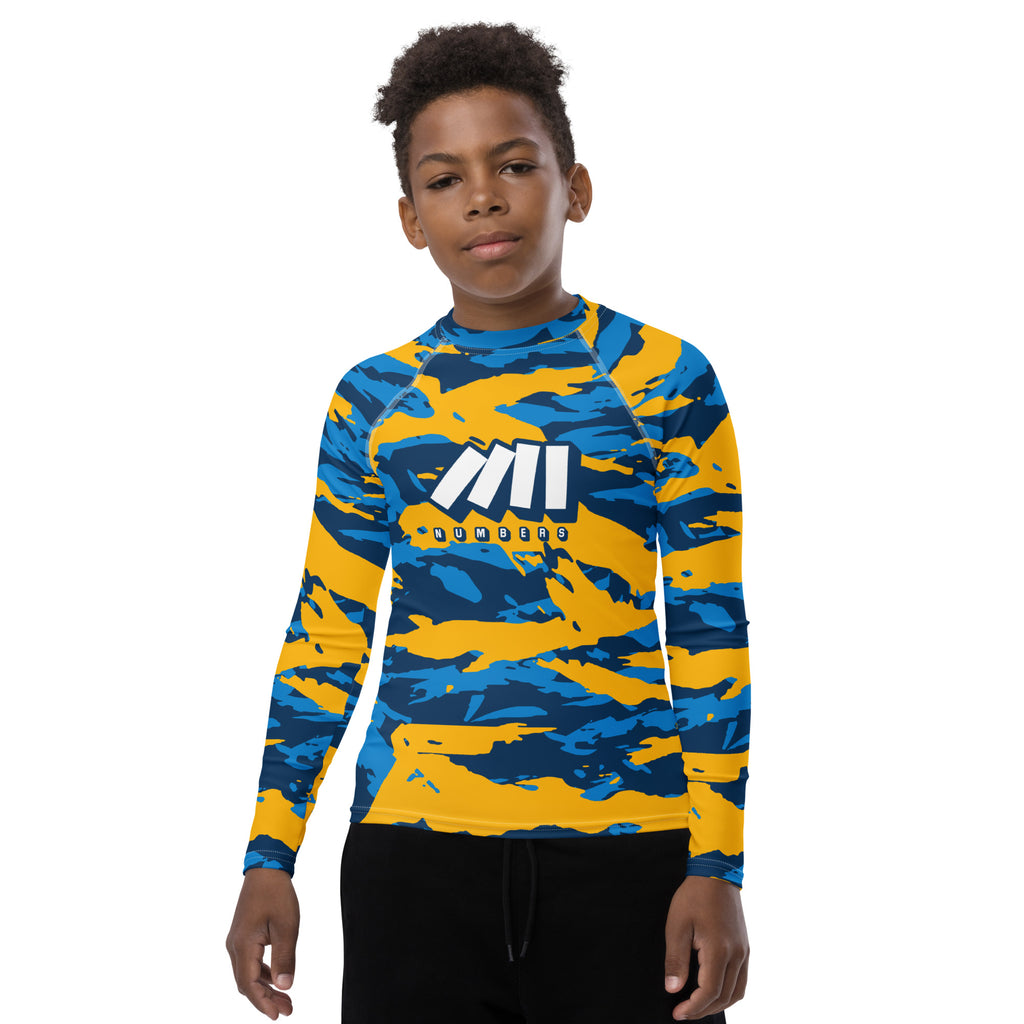 Athletic sports compression shirt for youth football, basketball, baseball, golf, softball etc similar to Nike, Under Armour, Adidas, Sleefs, printed with camouflage colors Los Angeles Chargers. 