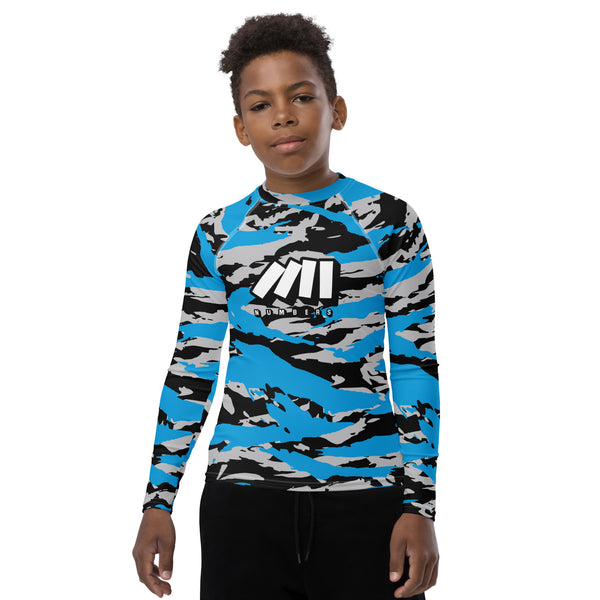 Athletic sports compression shirt for youth football, basketball, baseball, golf, softball etc similar to Nike, Under Armour, Adidas, Sleefs, printed with camouflage black, blue, and gray colors Carolina Panthers. 