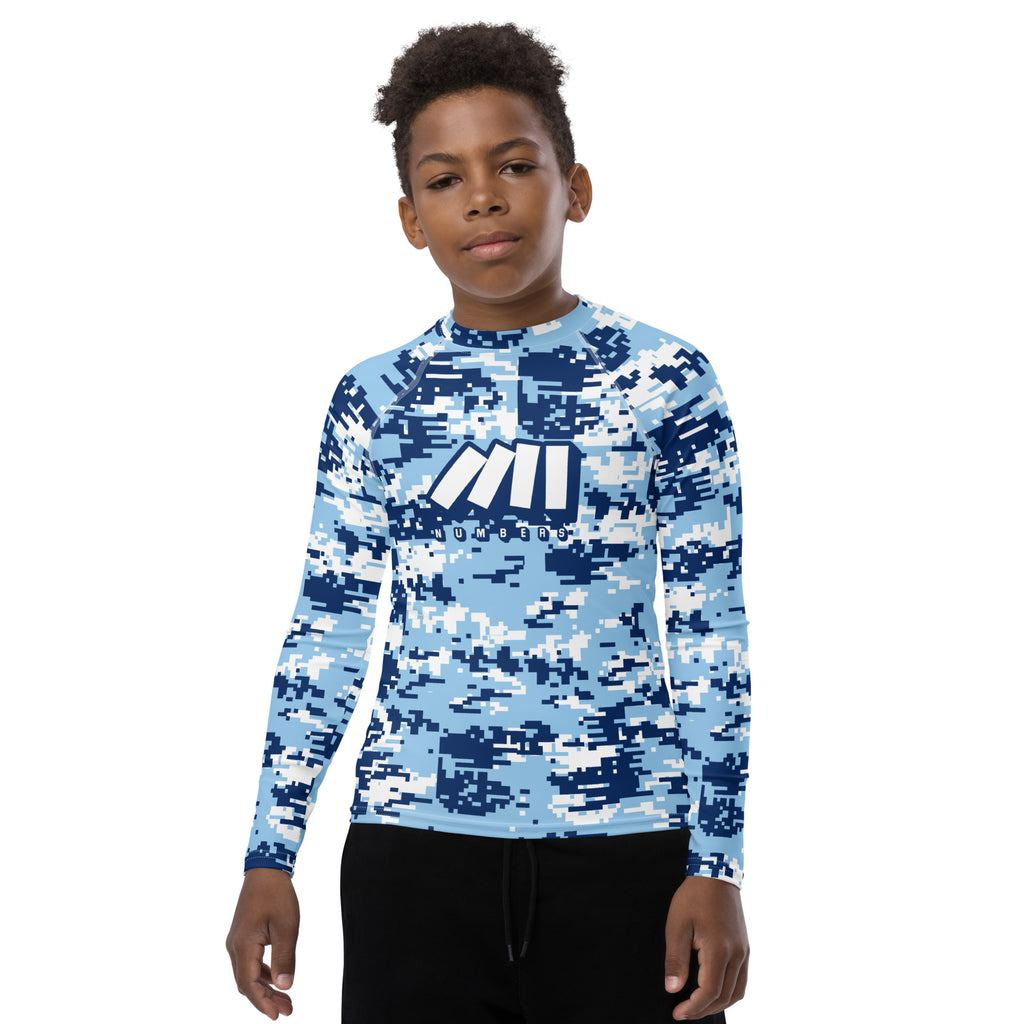 Athletic sports compression shirt for youth football, basketball, baseball, golf, softball etc similar to Nike, Under Armour, Adidas, Sleefs, printed with camouflage colors.   