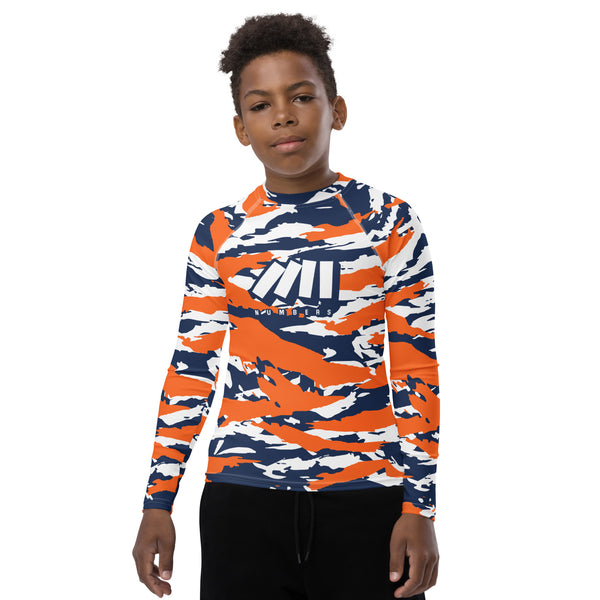 Athletic sports compression shirt for youth football, basketball, baseball, golf, softball etc similar to Nike, Under Armour, Adidas, Sleefs, printed with camouflage navy blue, orange, and white colors Denver Broncos.    