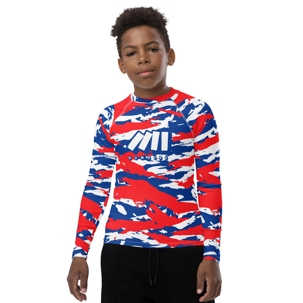 Athletic sports compression shirt for youth football, basketball, baseball, golf, softball etc similar to Nike, Under Armour, Adidas, Sleefs, printed with camouflage red, white, and blue colors Los Angeles Clippers.  