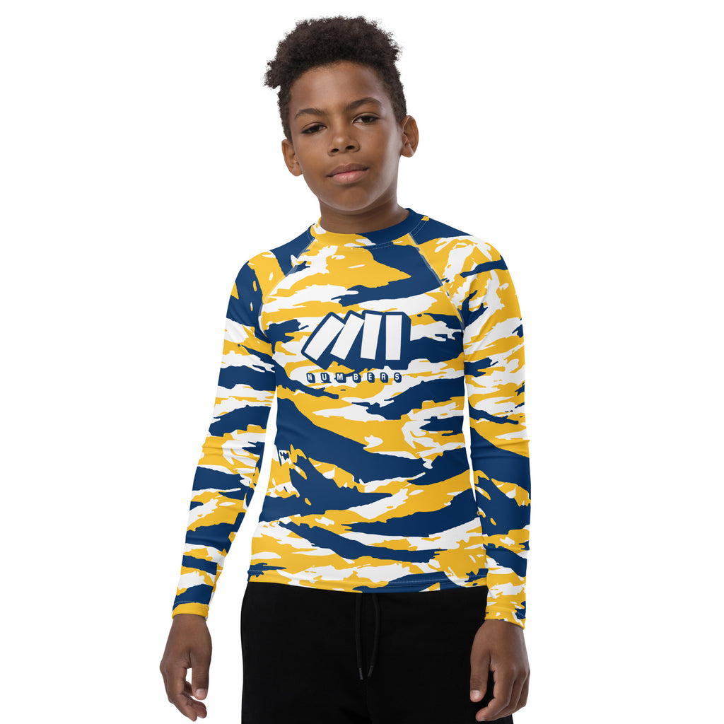 Athletic sports compression shirt for youth football, basketball, baseball, golf, softball etc similar to Nike, Under Armour, Adidas, Sleefs, printed with camouflage navy blue, yellow, and white colors.    