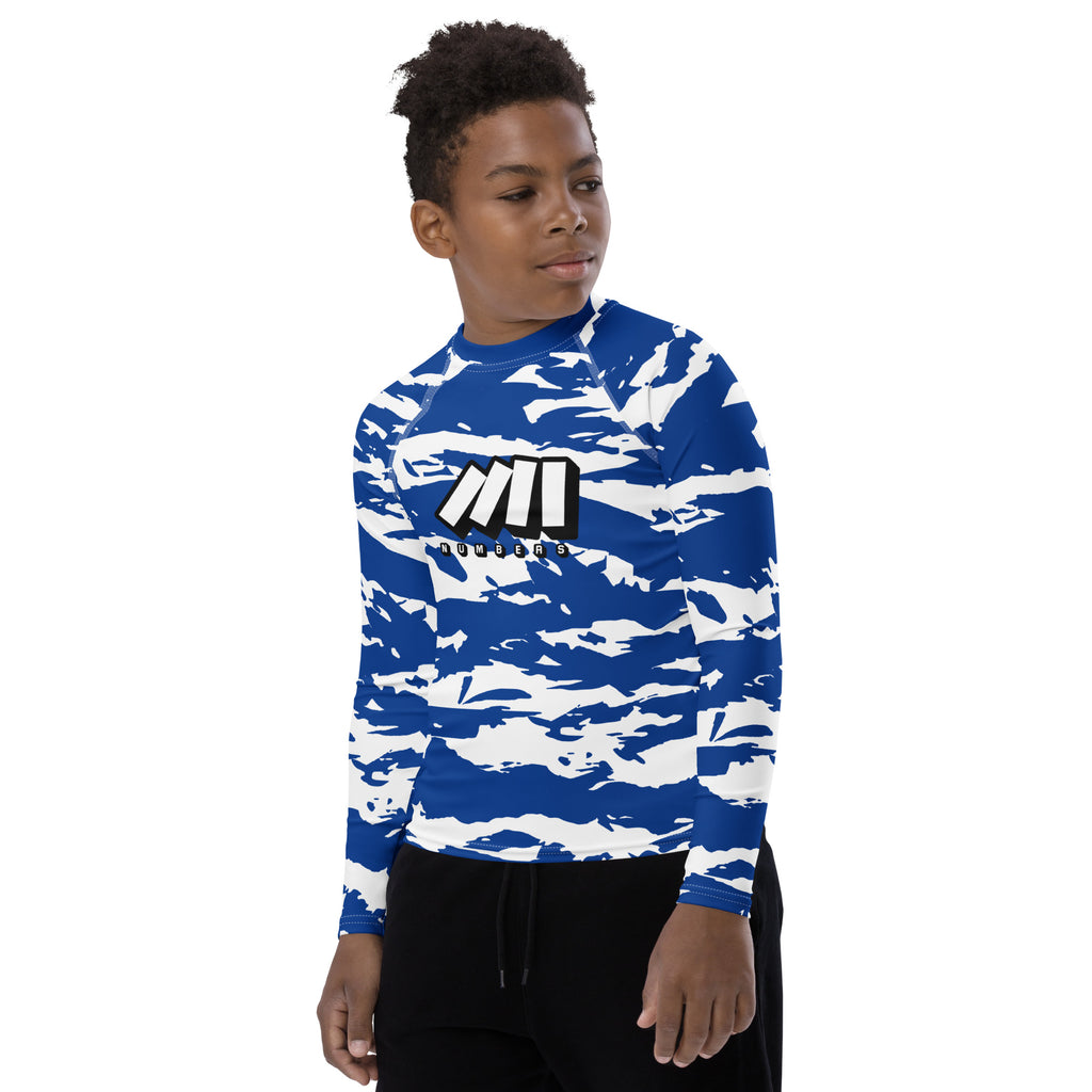 Athletic sports compression shirt for youth football, basketball, baseball, golf, softball etc similar to Nike, Under Armour, Adidas, Sleefs, printed with camouflage blue and white colors Indianapolis Colts. 