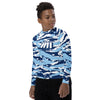 Athletic sports compression shirt for youth football, basketball, baseball, golf, softball etc similar to Nike, Under Armour, Adidas, Sleefs, printed with camouflage baby blue, white, and blue colors.   