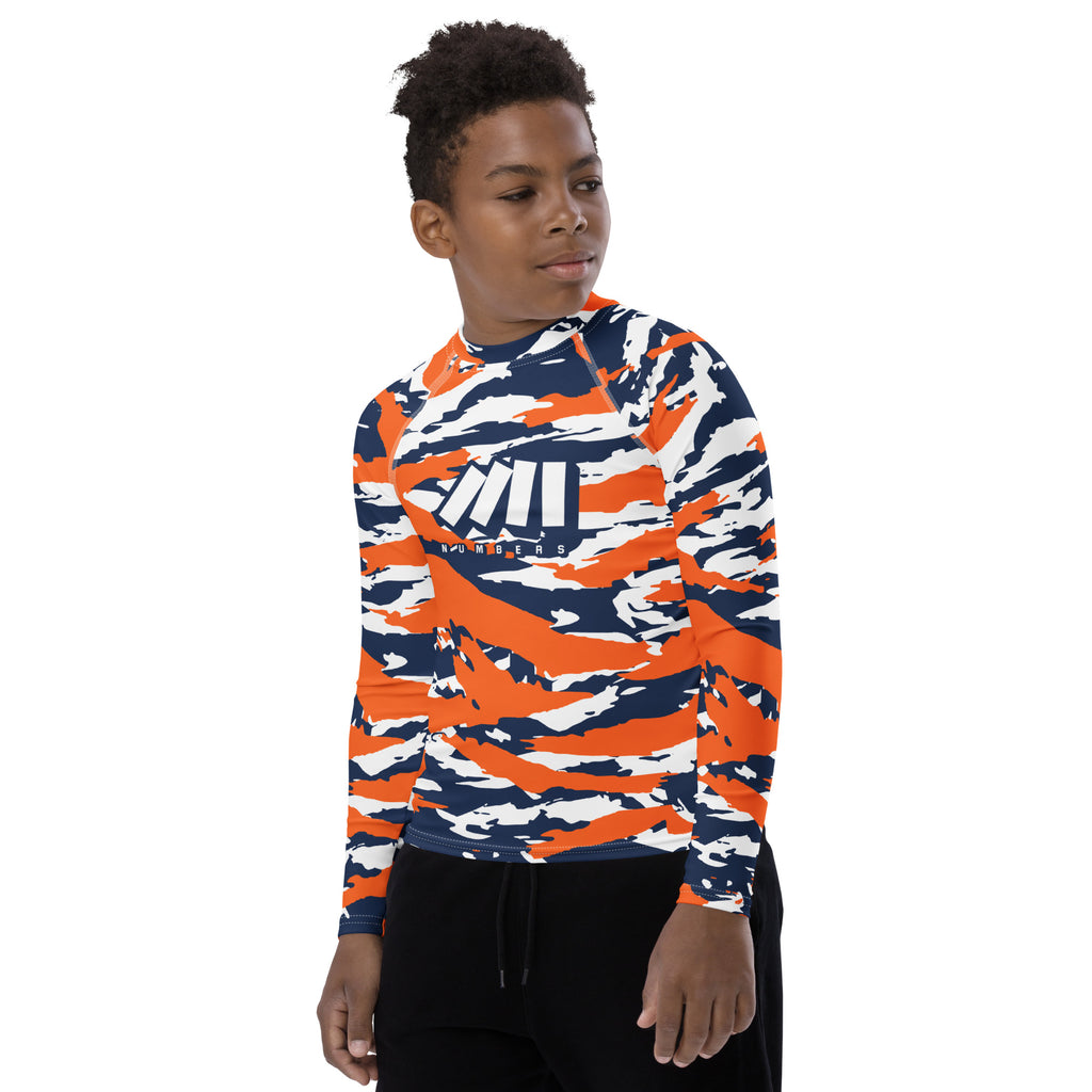 Athletic sports compression shirt for youth football, basketball, baseball, golf, softball etc similar to Nike, Under Armour, Adidas, Sleefs, printed with camouflage navy blue, orange, and white colors Denver Broncos. 