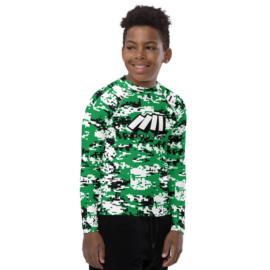 Athletic sports compression shirt for youth football, basketball, baseball, golf, softball etc similar to Nike, Under Armour, Adidas, Sleefs, printed with camouflage green, white, and black colors.     