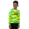 Athletic sports compression shirt for youth football, basketball, baseball, golf, softball etc similar to Nike, Under Armour, Adidas, Sleefs, printed with camouflage neon, yellow, white, and green colors.    