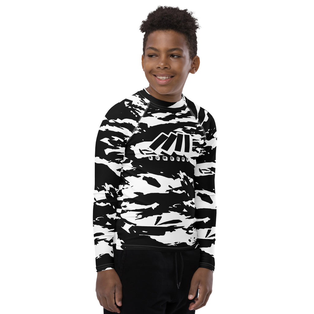 Athletic sports compression shirt for youth football, basketball, baseball, golf, softball etc similar to Nike, Under Armour, Adidas, Sleefs, printed with camouflage black and white colors.    