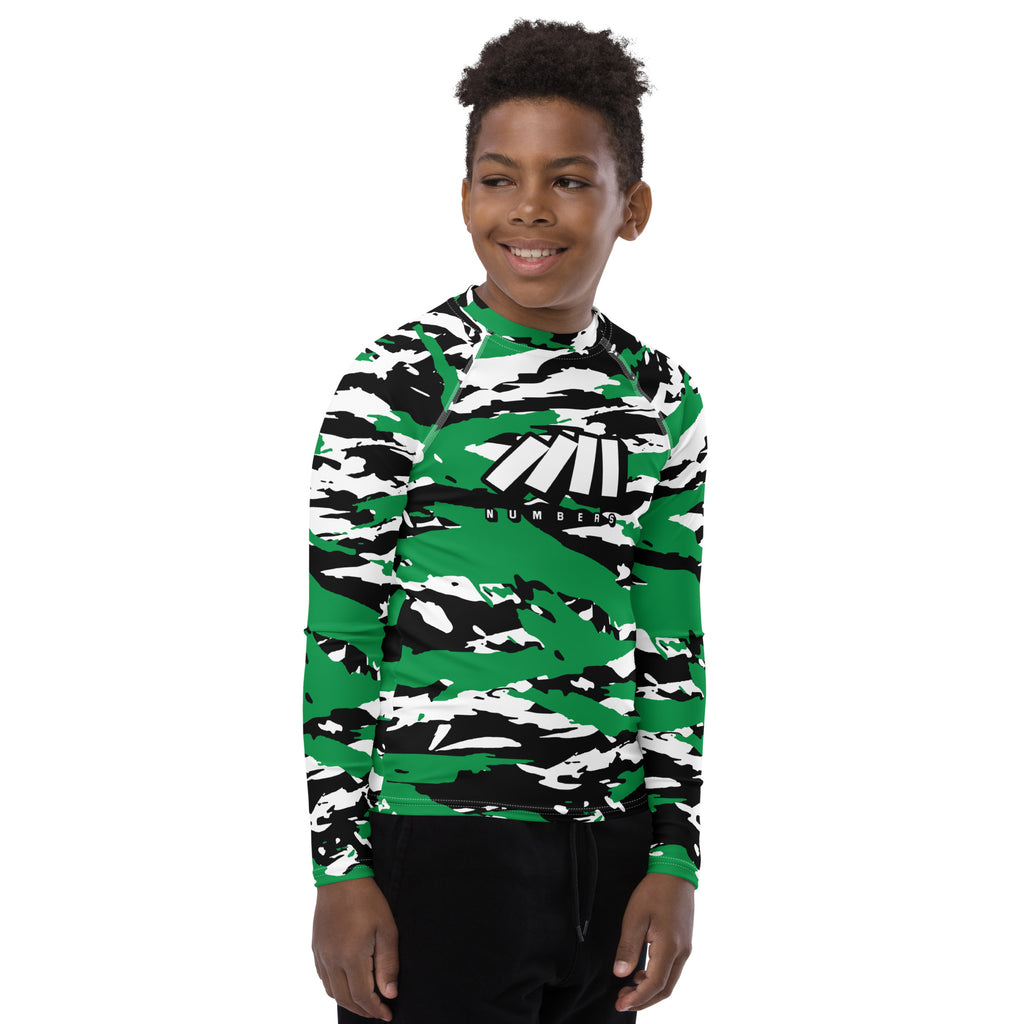 Athletic sports compression shirt for youth football, basketball, baseball, golf, softball etc similar to Nike, Under Armour, Adidas, Sleefs, printed with camouflage green, white, and black colors Boston Celtics.  