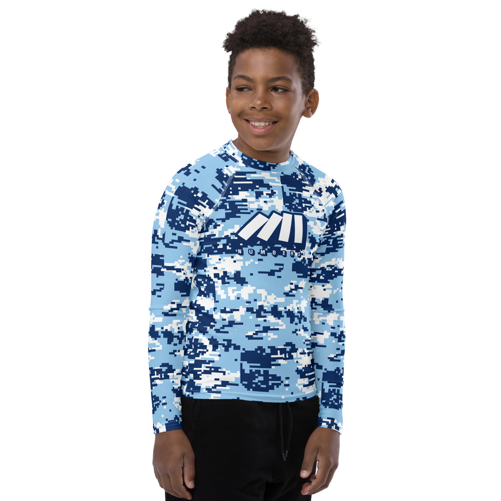 Athletic sports compression shirt for youth football, basketball, baseball, golf, softball etc similar to Nike, Under Armour, Adidas, Sleefs, printed with camouflage colors.   