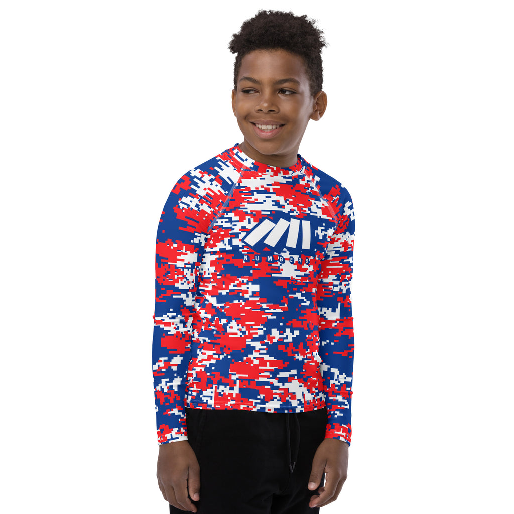Athletic sports compression shirt for youth football, basketball, baseball, golf, softball etc similar to Nike, Under Armour, Adidas, Sleefs, printed with camouflage red, white, and blue colors Los Angeles Clippers.    