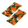 Athletic sports sweatband wide headband for youth and adult football, basketball, baseball, softball, gym workout, printed with green, orange, and white colors. 
