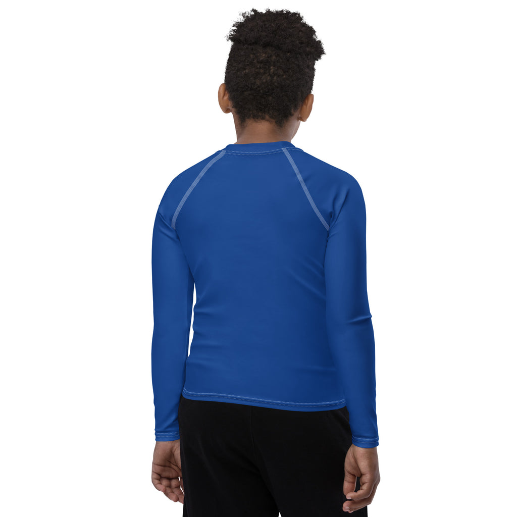 Athletic sports compression shirt for youth football, basketball, baseball, golf, softball etc similar to Nike, Under Armour, Adidas, Sleefs, printed in the color royal blue