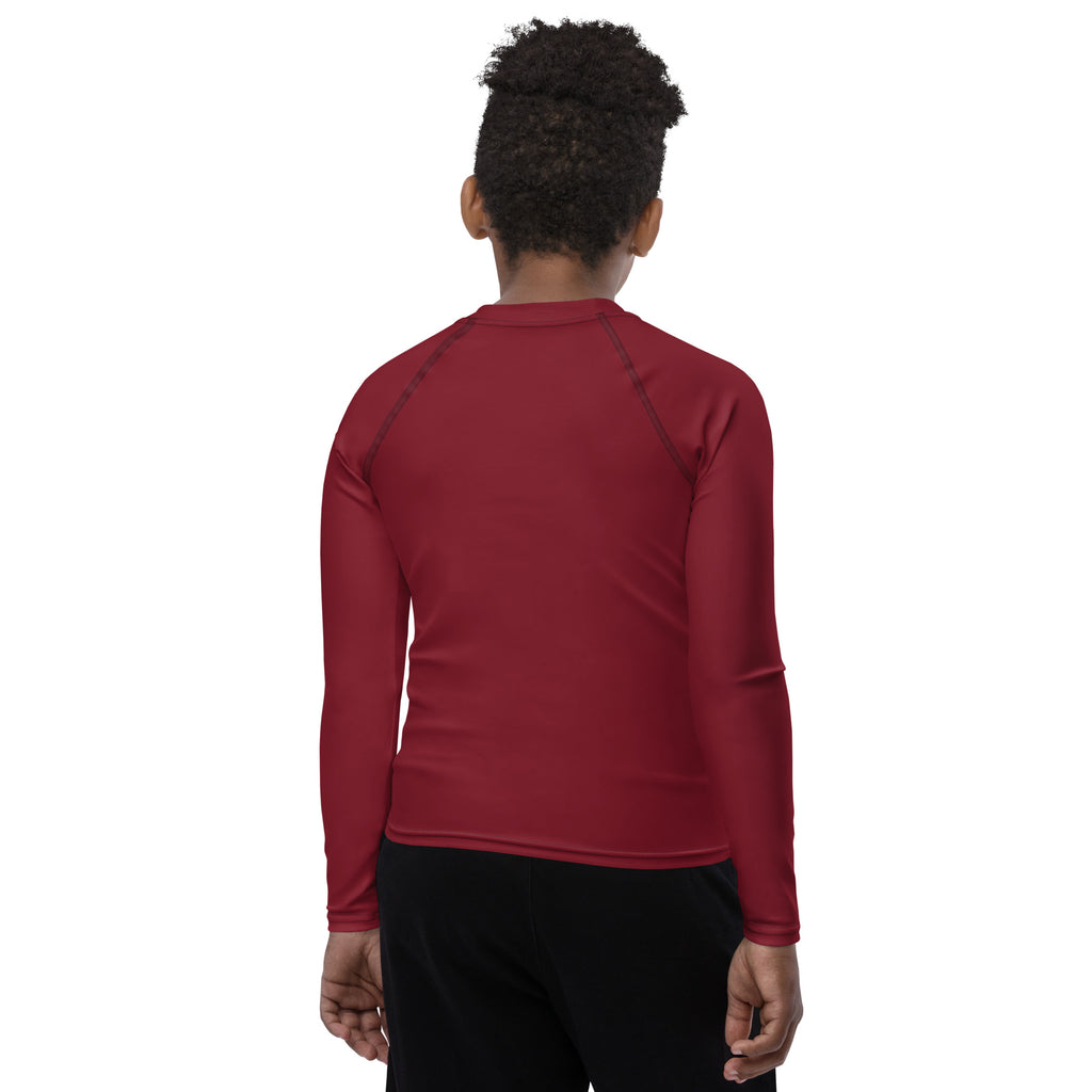 Athletic sports compression shirt for youth football, basketball, baseball, golf, softball etc similar to Nike, Under Armour, Adidas, Sleefs, printed with in the color maroon