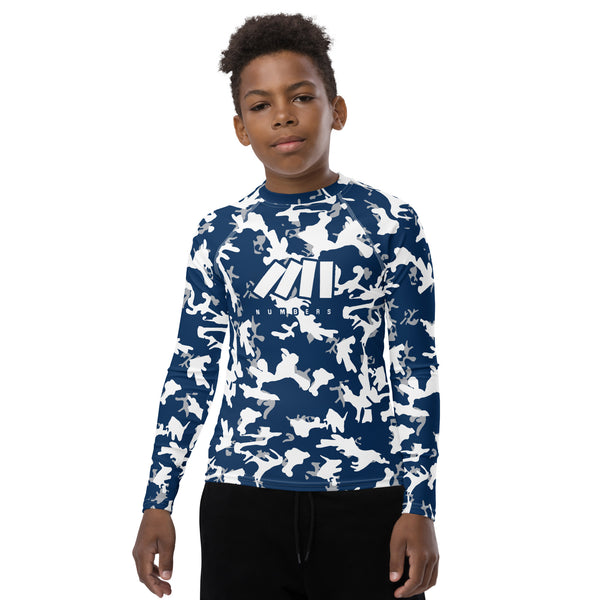 Athletic sports compression shirt for youth football, basketball, baseball, golf, softball etc similar to Nike, Under Armour, Adidas, Sleefs, printed with camouflage blue, white, and gray Dallas Cowboys