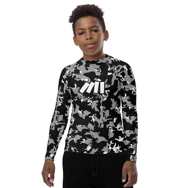 Athletic sports compression shirt for youth football, basketball, baseball, golf, softball etc similar to Nike, Under Armour, Adidas, Sleefs, printed with camouflage black, gray and white Las Vegas Raiders colors