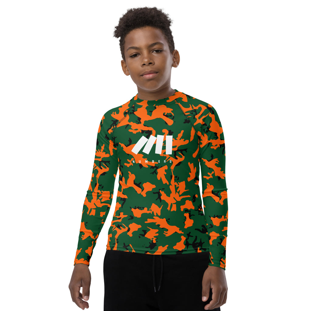 Athletic sports compression shirt for youth football, basketball, baseball, golf, softball etc similar to Nike, Under Armour, Adidas, Sleefs, printed with camouflage orange, green and black Miami Hurricanes colors