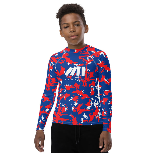 Athletic sports compression shirt for youth football, basketball, baseball, golf, softball etc similar to Nike, Under Armour, Adidas, Sleefs, printed with camouflage red, blue and white LA Clippers colors