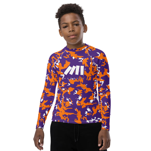 Athletic sports compression shirt for youth football, basketball, baseball, golf, softball etc similar to Nike, Under Armour, Adidas, Sleefs, printed with camouflage purple, orange and white Phoenix Suns colors