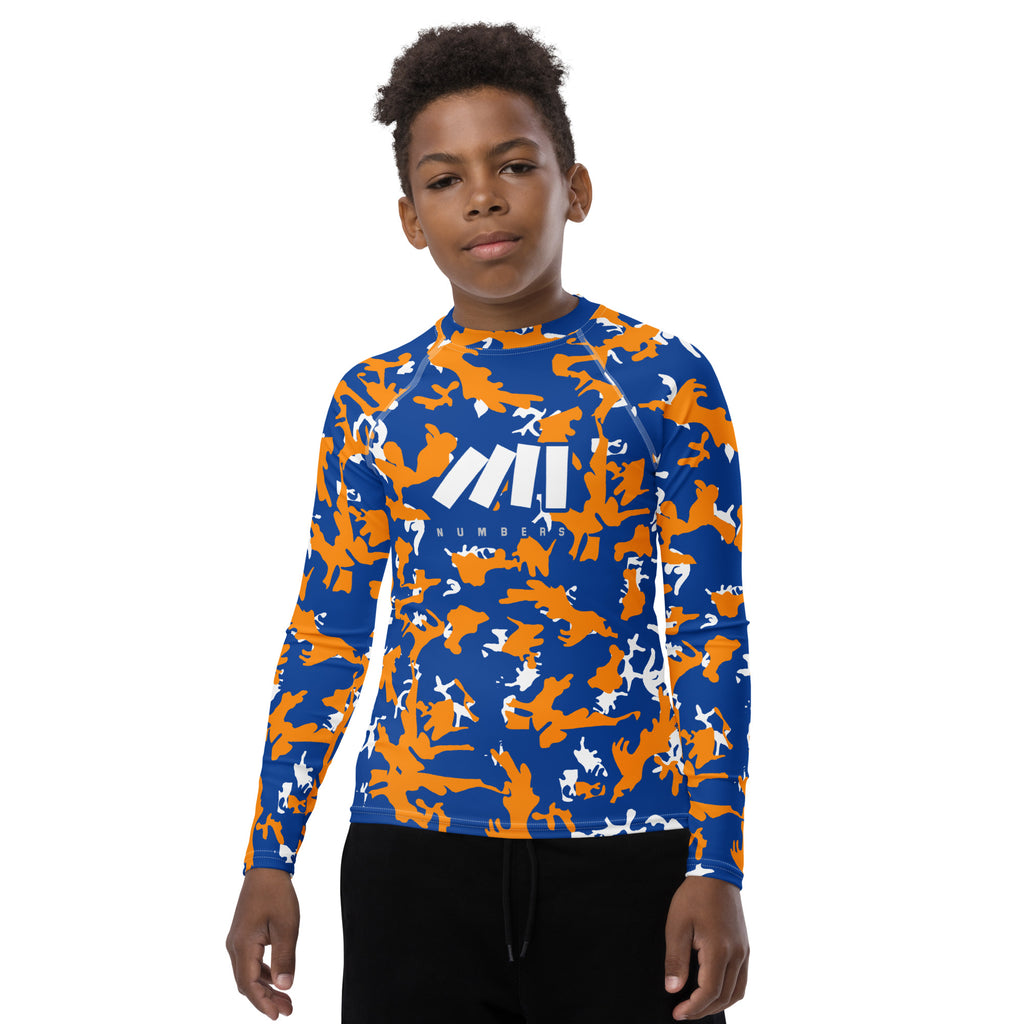 Athletic sports compression shirt for youth football, basketball, baseball, golf, softball etc similar to Nike, Under Armour, Adidas, Sleefs, printed with camouflage orange, blue and white New York Mets colors