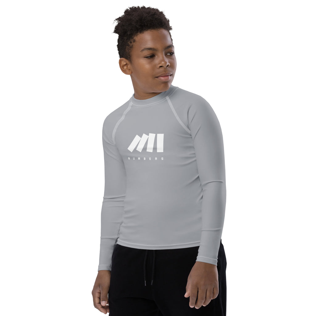 Athletic sports compression shirt for youth football, basketball, baseball, golf, softball etc similar to Nike, Under Armour, Adidas, Sleefs, printed with in the color gray