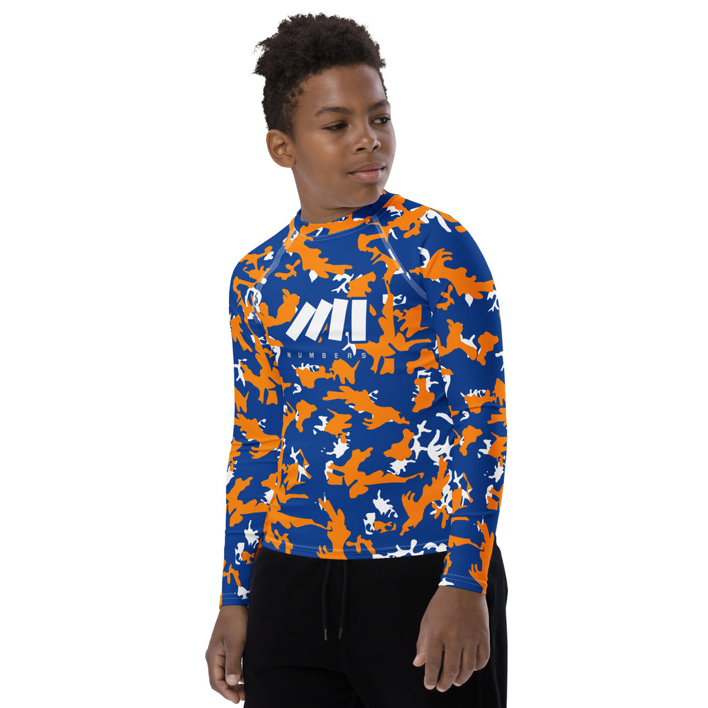 Athletic sports compression shirt for youth football, basketball, baseball, golf, softball etc similar to Nike, Under Armour, Adidas, Sleefs, printed with camouflage orange, blue and white Boise State Broncos colors