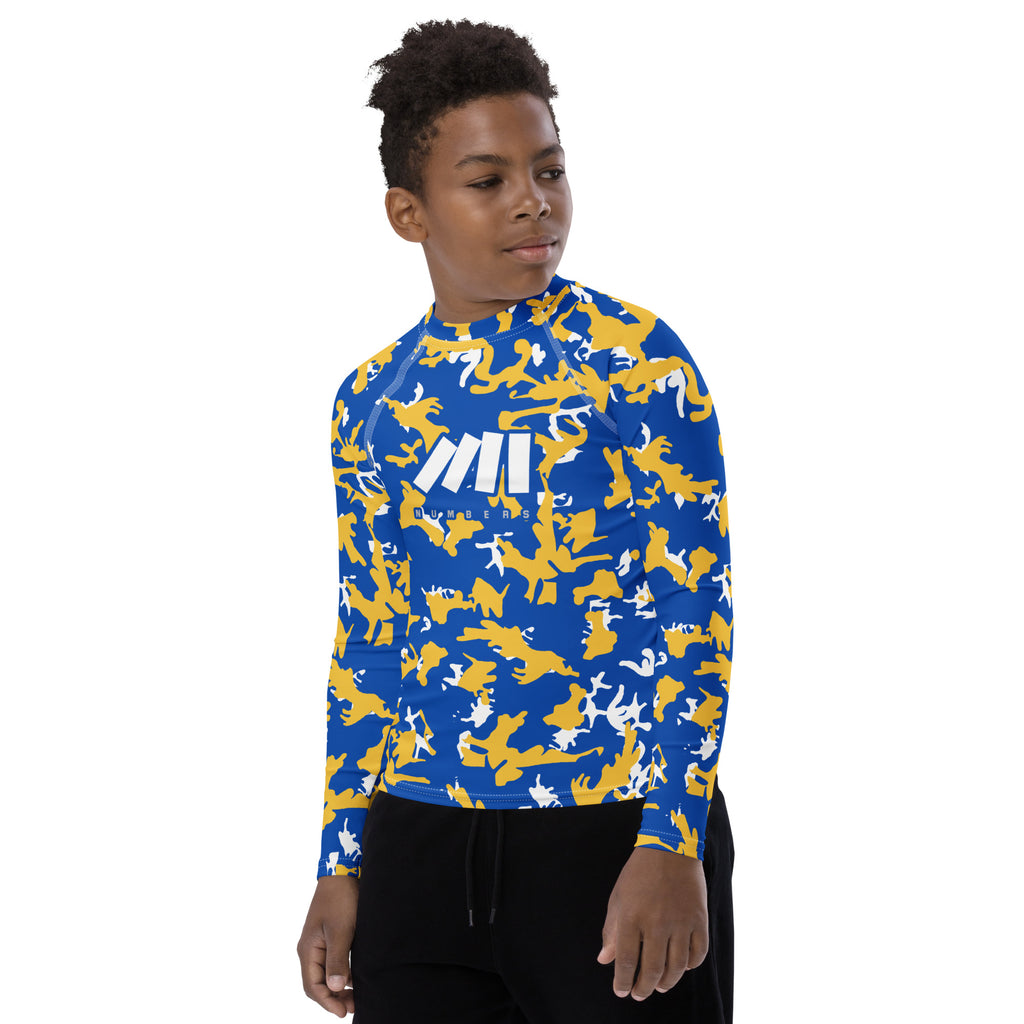 Athletic sports compression shirt for youth football, basketball, baseball, golf, softball etc similar to Nike, Under Armour, Adidas, Sleefs, printed with camouflage blue, yellow, and white Golden State Warriors colors