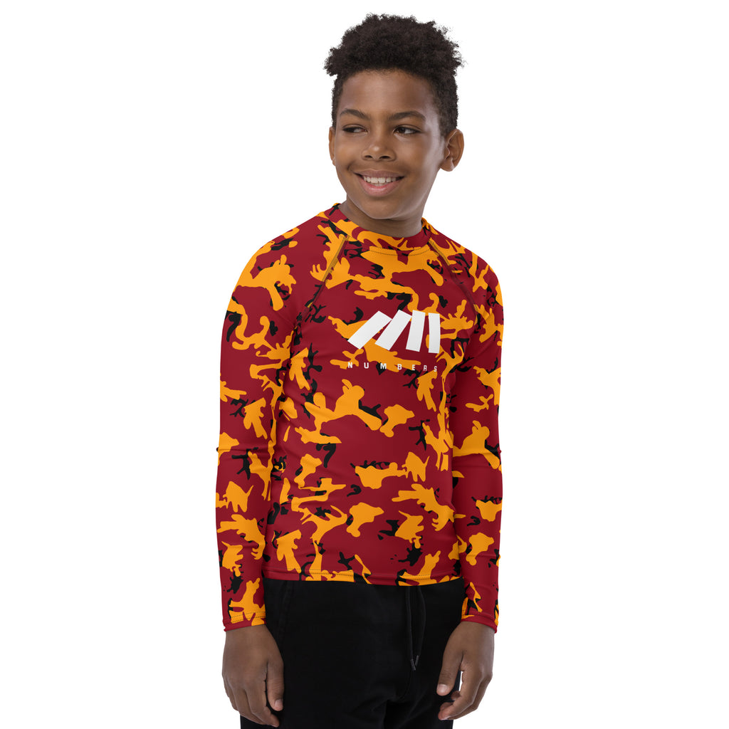 Athletic sports compression shirt for youth football, basketball, baseball, golf, softball etc similar to Nike, Under Armour, Adidas, Sleefs, printed with camouflage maroon, yellow and black Washington Commanders colors