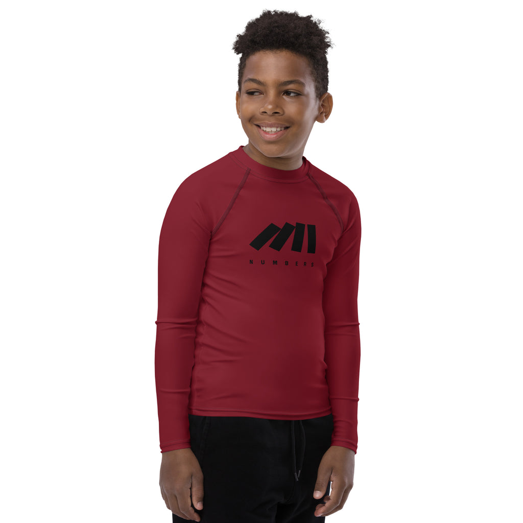 Athletic sports compression shirt for youth football, basketball, baseball, golf, softball etc similar to Nike, Under Armour, Adidas, Sleefs, printed with in the color maroon