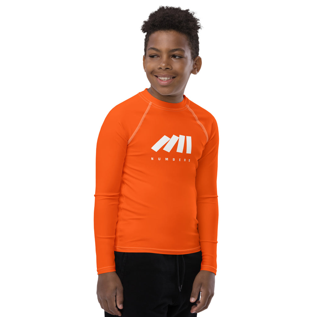 Athletic sports compression shirt for youth football, basketball, baseball, golf, softball etc similar to Nike, Under Armour, Adidas, Sleefs, printed in the color orange